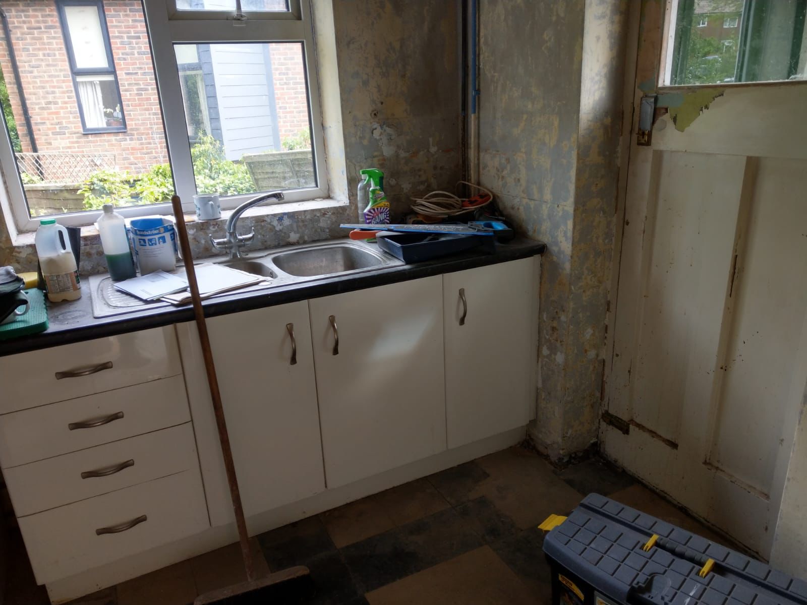 Kitchen sink area before